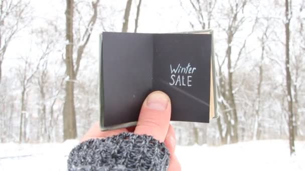 Venta de invierno. Libro vintage con inscripción — Vídeo de stock