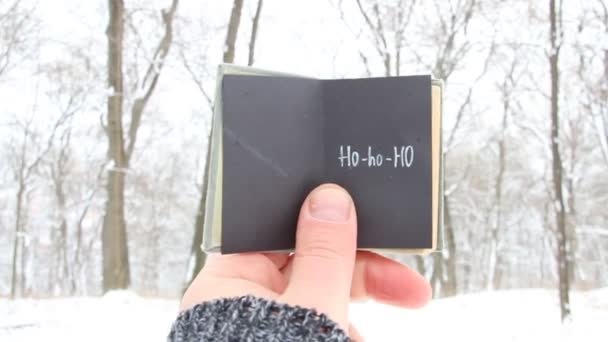 Ho ho ho. boeken en tekst. — Stockvideo