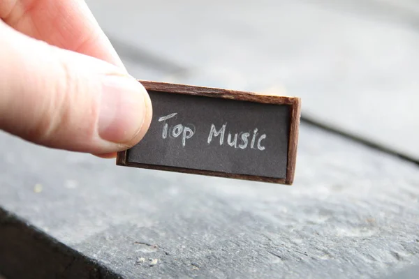 Música top, inscripción en el plato, estilo vintage — Foto de Stock