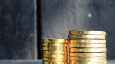 Profit growth, business concept. Graph of gold coins.