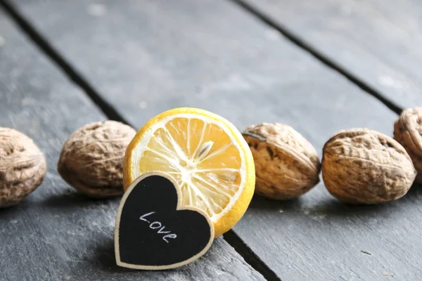 Love Background Heart Inscription Love Lemon Nuts — Stock Photo, Image