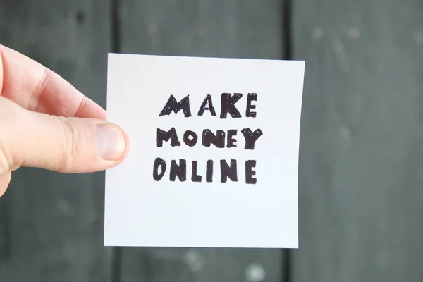 Make money online, note on vintage background.