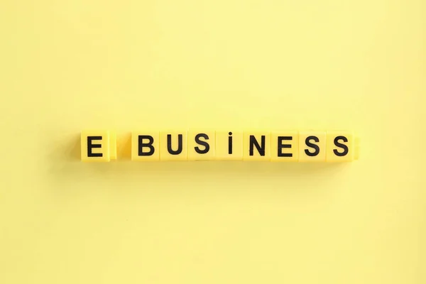 e business creative concept, yellow letters on a yellow background