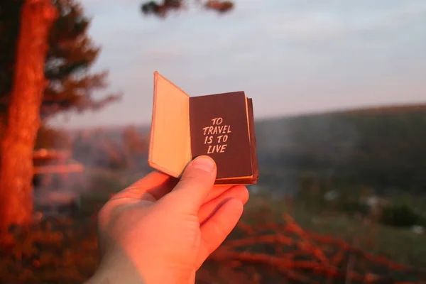 Travel Concept Hand Holds Book Inscription Background Forest — Stock Photo, Image