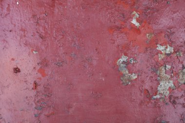 Metal yüzey arkaplan dokusunda kırmızı boya soyuluyor