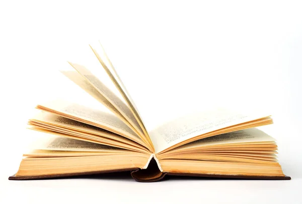 beyaz zemin üzerinde eski açık kitap