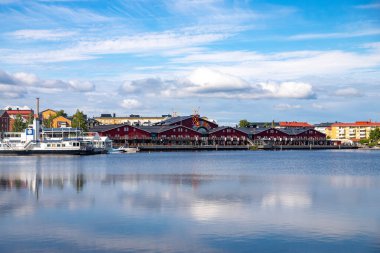 Lulea, Sweden - July 05, 2019: Panorama city, Cathedral sunny day, blue sky clipart