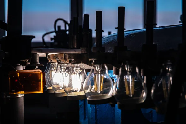 Automated workshop conveyor for production of glass lamps bulbs factory — Stock Photo, Image