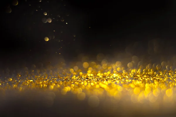 Glitter gold grunge blur abstract background. Lights twinkly dust and christmas texture — 스톡 사진