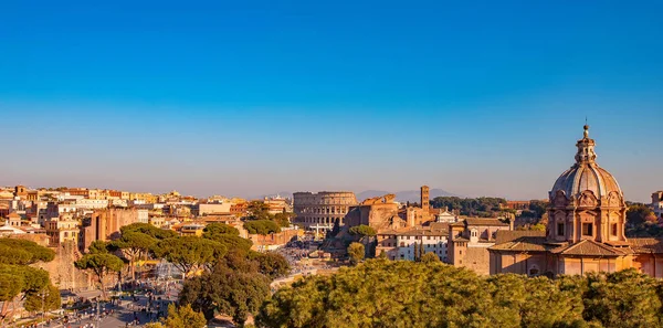 Panorama Rome Italy, sunset city Colosseum ruins Roman Forum from square of Venice — Stock Photo, Image