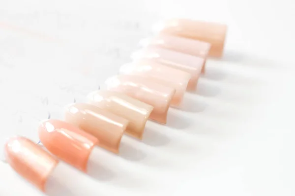 Set color samplers of fake nails for choosing manicure and gel polish — ストック写真