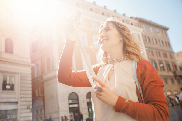 Female traveler photographer dslr camera on european and taking picture