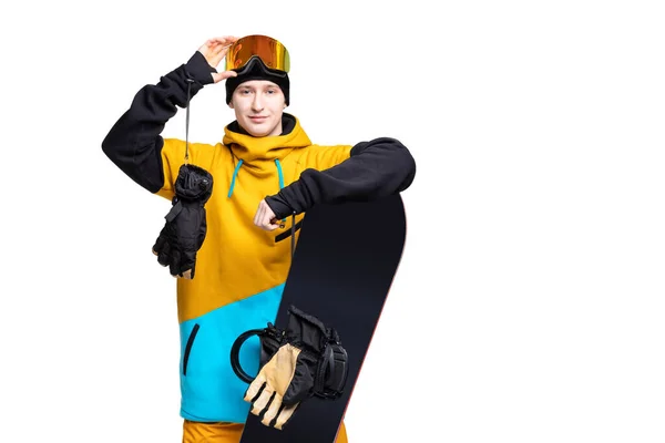 Portrait young man in sportswear safety glasses with snowboard isolated white background banner — Stock Photo, Image