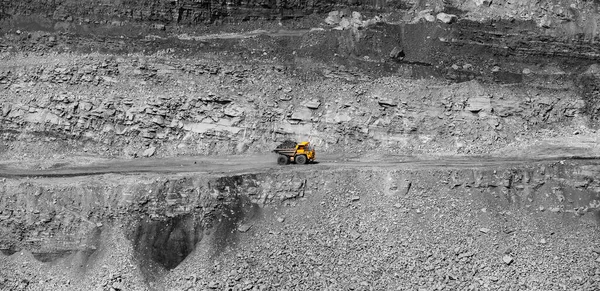 Big yellow mining truck coal transportation. Open pit mine industry