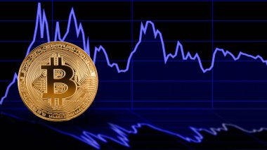 Grafik diyagramının arka planında altın Bitcoin kripto para birimi