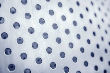 Profesyonel delikli ve parlak ışıklı endüstriyel demir arka plan