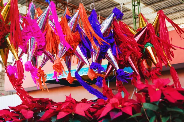 Mexican Piatas for Christmas in a traditional market in Mexico