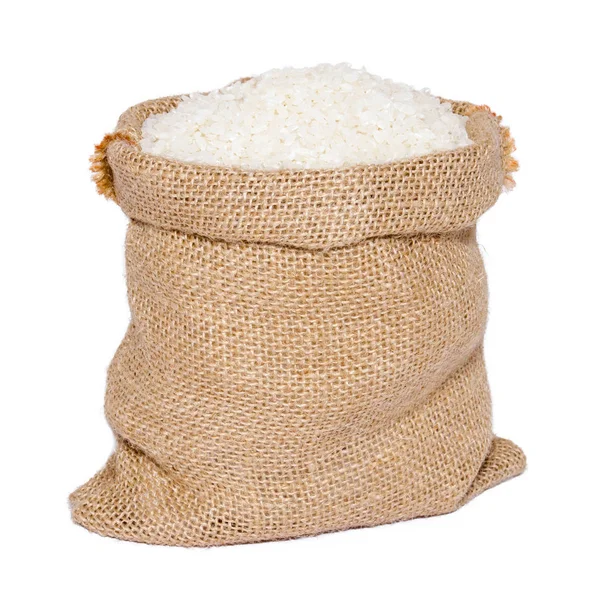 Άσπρο ρύζι σε σάκο λινάτσα — Φωτογραφία Αρχείου