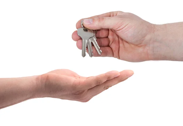 A agent hand give keys Royalty Free Stock Images