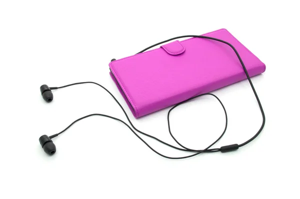 Hoofdtelefoon met roze mobiele telefoon — Stockfoto