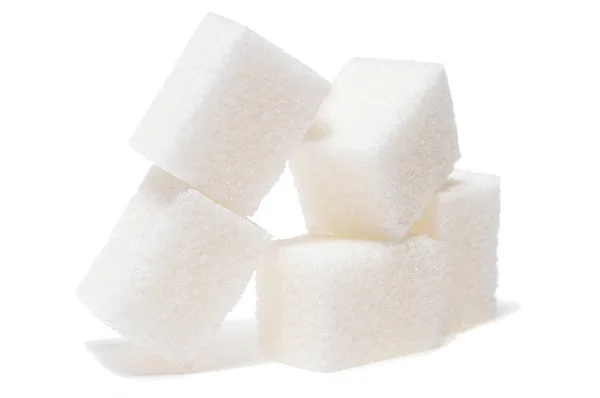 Группа кубиков сахара на белом фоне — стоковое фото