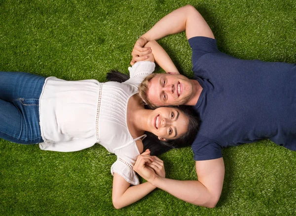 Family Laying In The Grass — Stock Photo, Image