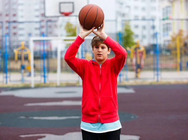Cute Boy Red Shirt Plays Basketball City Playground Active Teen — 스톡 사진