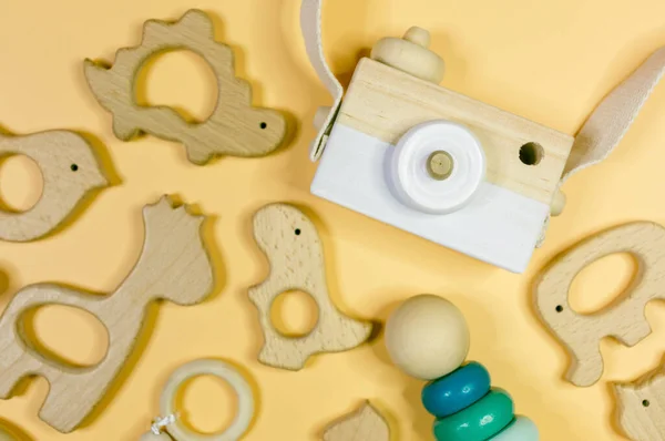 Close Cute Nice Small Wooden Baby Teethers Different Shapes Yellow — Stock Photo, Image