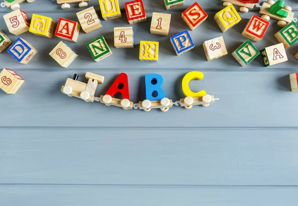 Feche Letras Madeira Multicoloridas Com Abc Fundo Cinza Conjunto Brinquedos — Fotografia de Stock