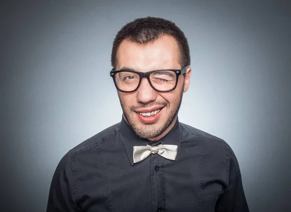 Happy dealer isolated on gray — Stock Photo, Image