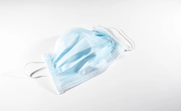 Disposable mask, surgical mask for protect against COVID-19 Coronavirus. Isolated on white