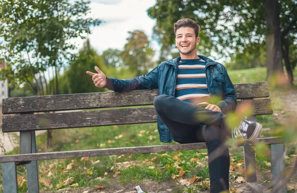 Conversational Friendly Young Man Outdoor Sitting Bench Park Nature — Stock Photo, Image