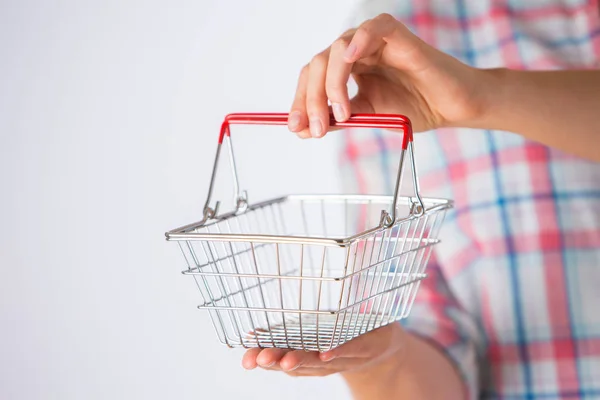 Woman Holding Empty Model Shopping Basket — Stock Photo, Image