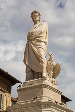 Statue of Durante degli Alighieri, also called Dante and eagle in Florence, Italy clipart