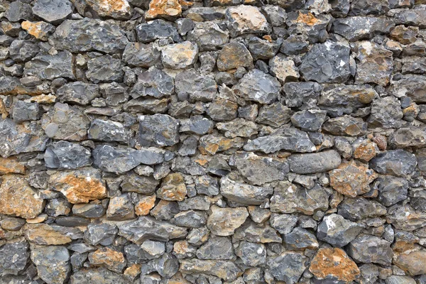 Background texture photo of stone wall made of rocks — Stock Photo, Image