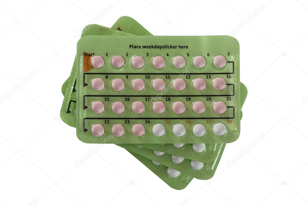 Stack of Birth control pill in 28 pill packages. 24 hormone pills