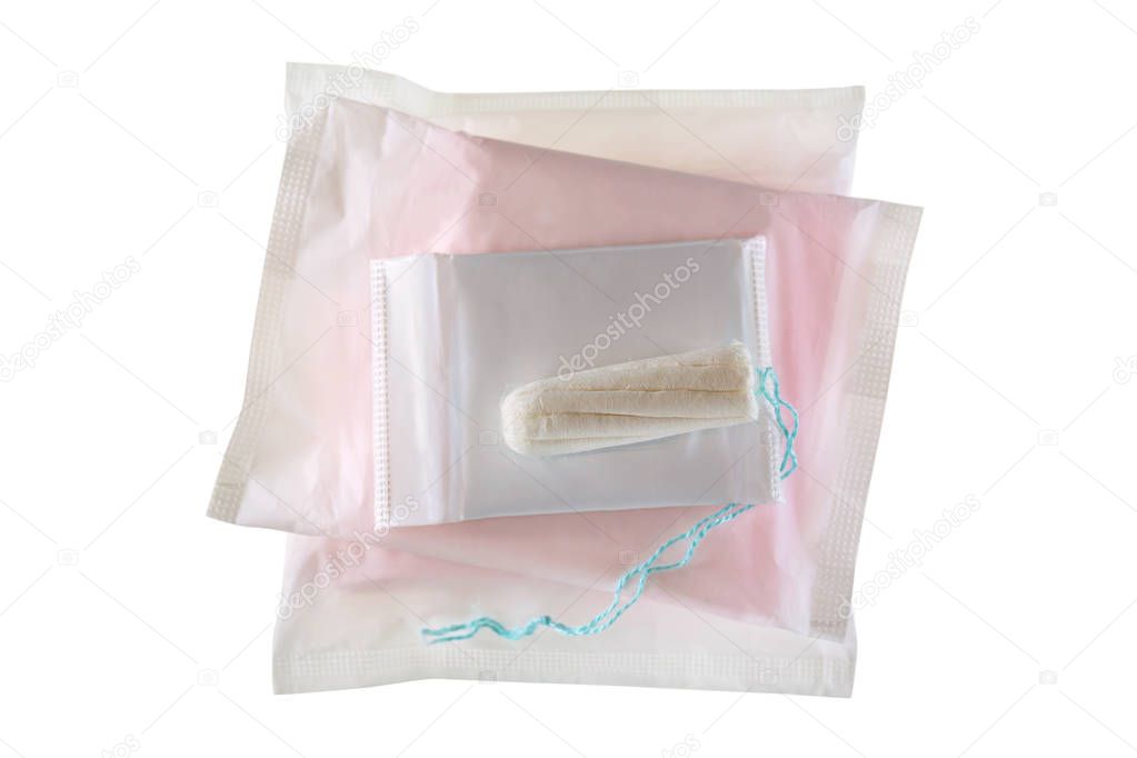 New unused tampon on pile of Sanitary napkins (sanitary towel, sanitary pad, menstrual pad)