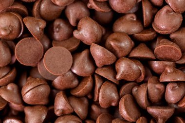 Küçük parçalar şekerli çikolata parçaları arka plan doku makro