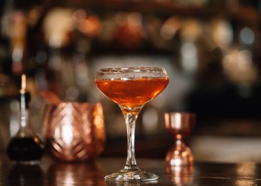 A handcrafted specialty brown liquor cocktail 