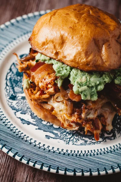 Smoked BBQ Chicken Sandwich on beautiful blue plate — Stock Photo, Image