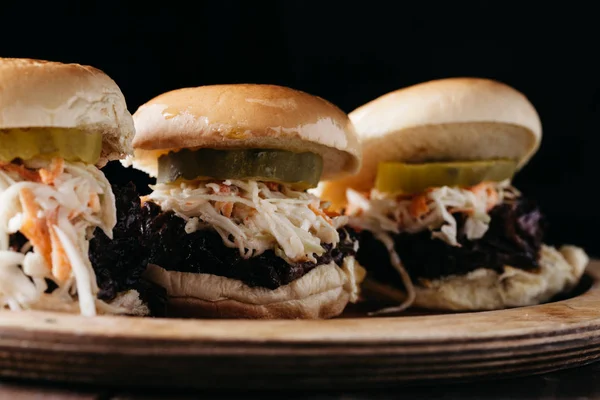 Pulled pork sliders on a wooden plate — Stock Photo, Image