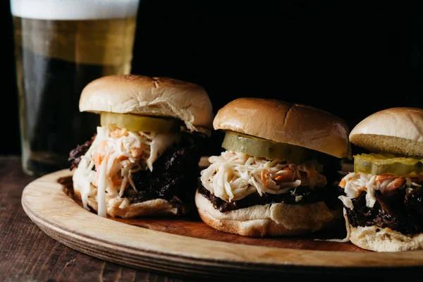 Pulled pork sliders on a wooden plate — Stock Photo, Image