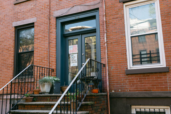 Hoboken, NJ, USA - May 14th 2020 : Sign on a residential building expressing gratitude to front liners and  spreading a message of love, solidarity and community support