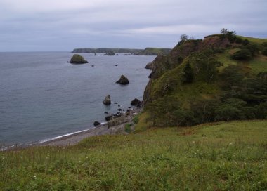 Pacific bay of Shikotan island clipart
