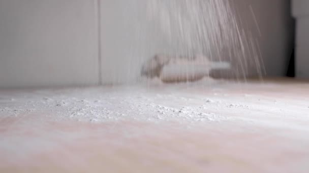 Cook rolls flour on wooden table — Αρχείο Βίντεο