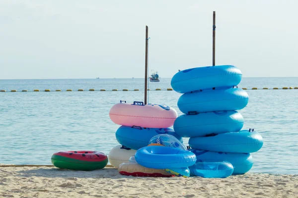 Rubber rings stacked at the beach.