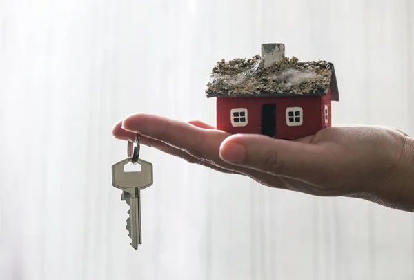 Hand hold house miniature and key
