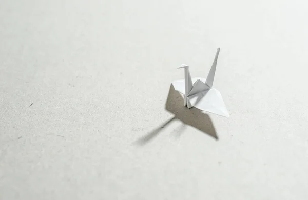 Gru origami su sfondo — Foto Stock