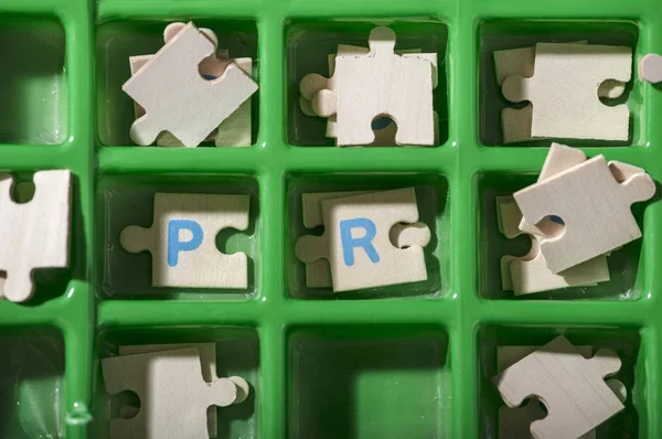 Slovo Pr na puzzle — Stock fotografie
