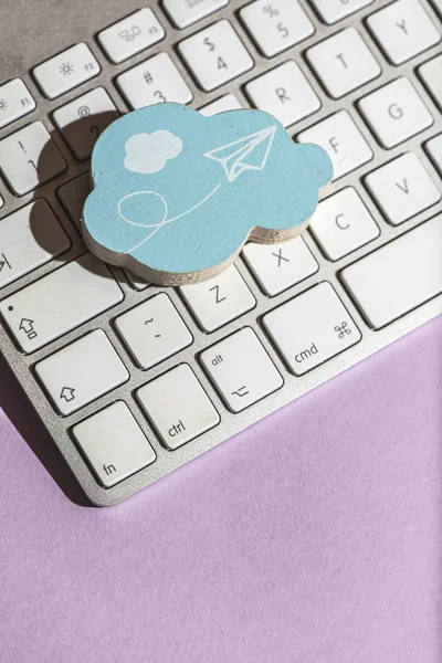 Cloud figure on keyboard  close up